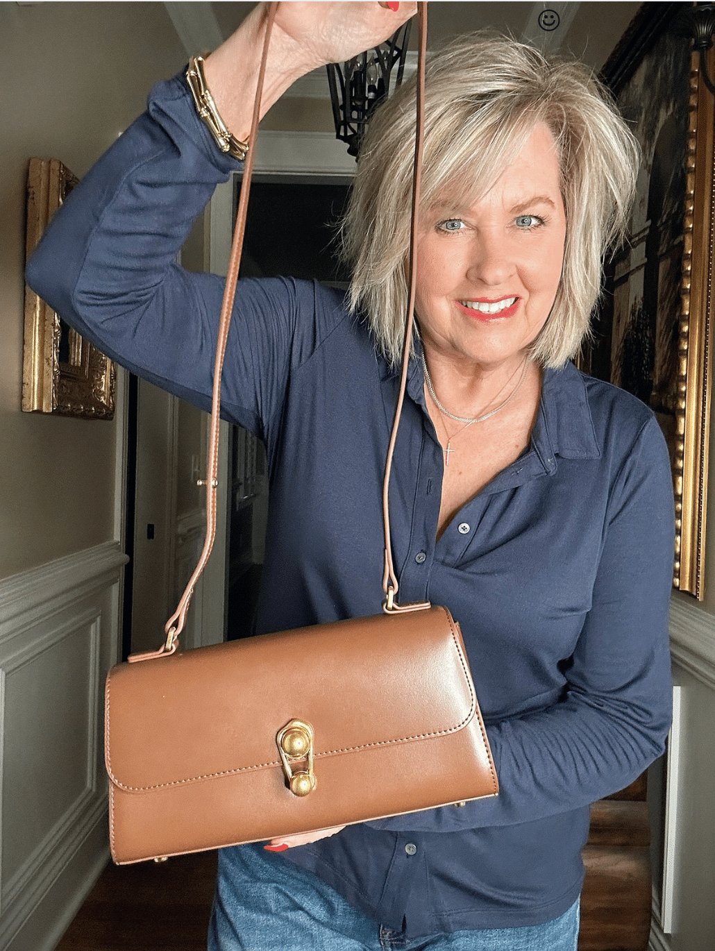 Tania Stephens showing a brown crossbody from Amazon